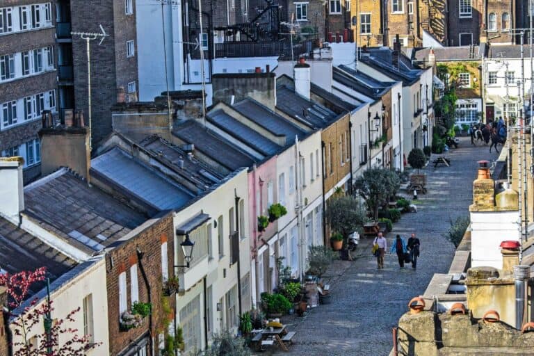 A view from the top of residential buildings with cobblestone street in the concept of 'best affordable housing options in Battersea'.